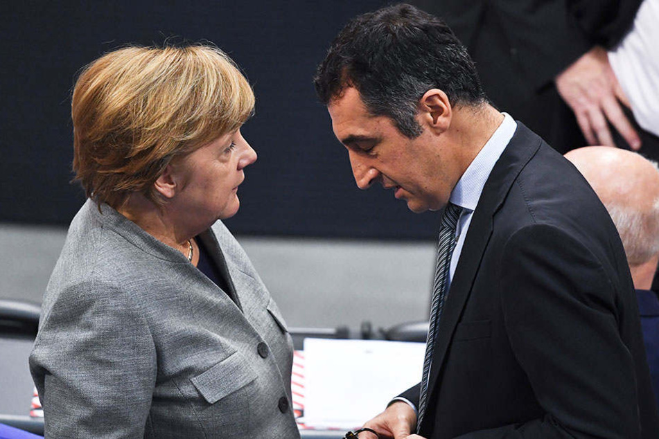 Grünen-Politiker Cem Özdemir (51) bei Sondierungsgesprächen mit Bundeskanzlerin Angela Merkel (63, CDU)