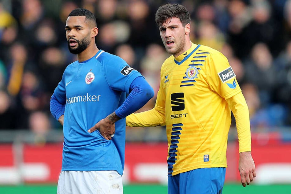 Braunschweigs Benjamin Kessel (r.) brachte die "Löwen" mit 1:0 in Führung. Hansa Rostock um Cebio Soukou hatte das Nachsehen.