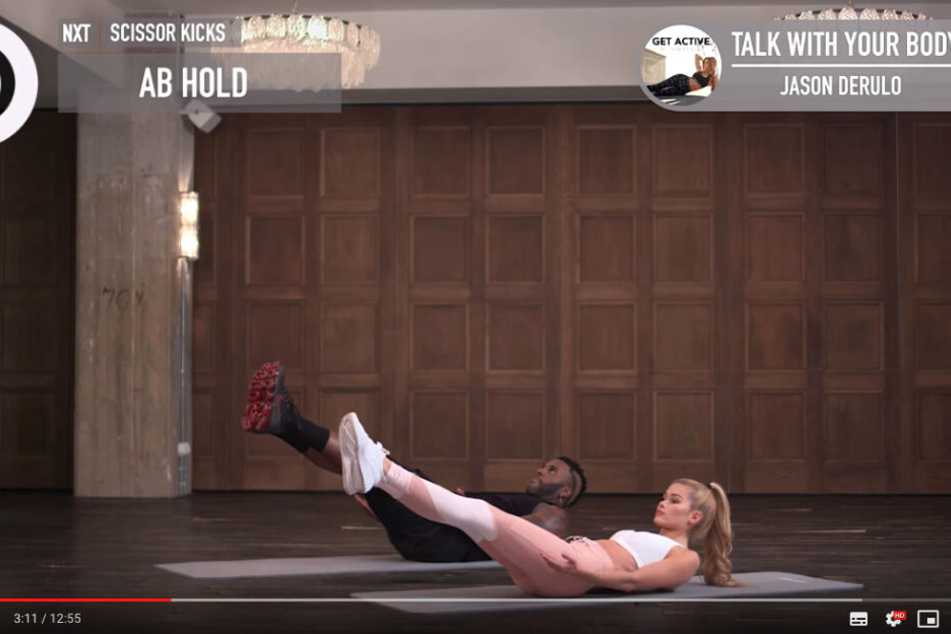 Screenshot aus dem YouTube-Video: Pamela Reif und Jason Derulo trainieren im Video.