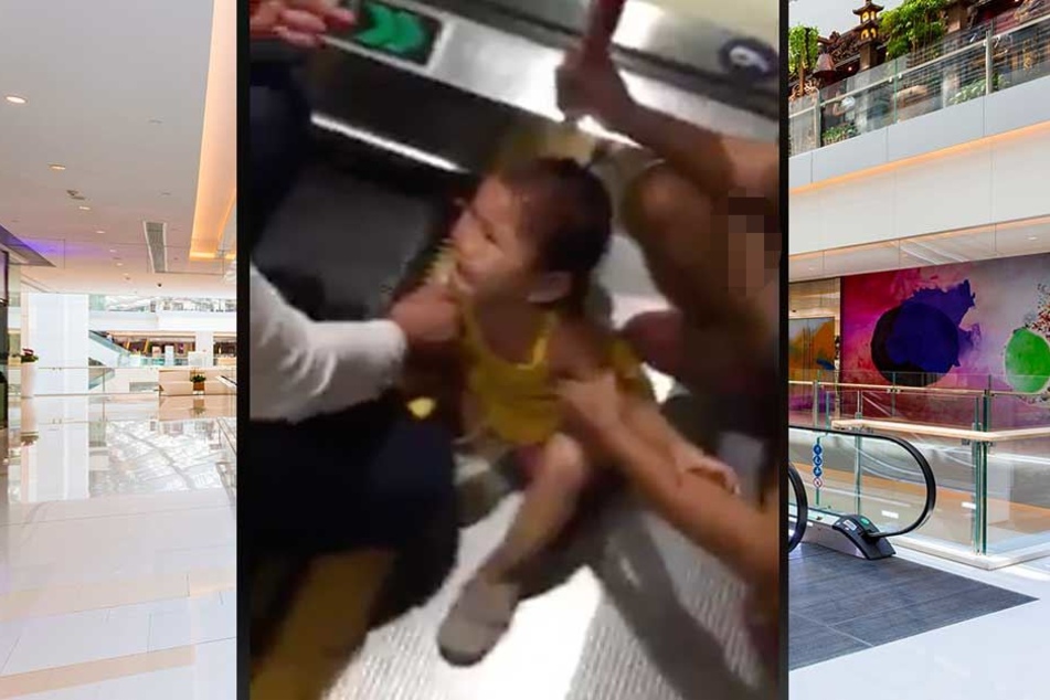 Das weinenden Kind sitzt an der Rolltreppe, in der es sich seine Finger eingeklemmt hat.