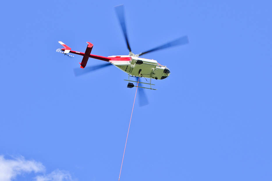 Für die Erkundungen wird der Helikopter 60 bis 70 Meter über dem Erdboden fliegen und an einem Seil eine Sonde hinter sich schleppen. (Symbolbild)