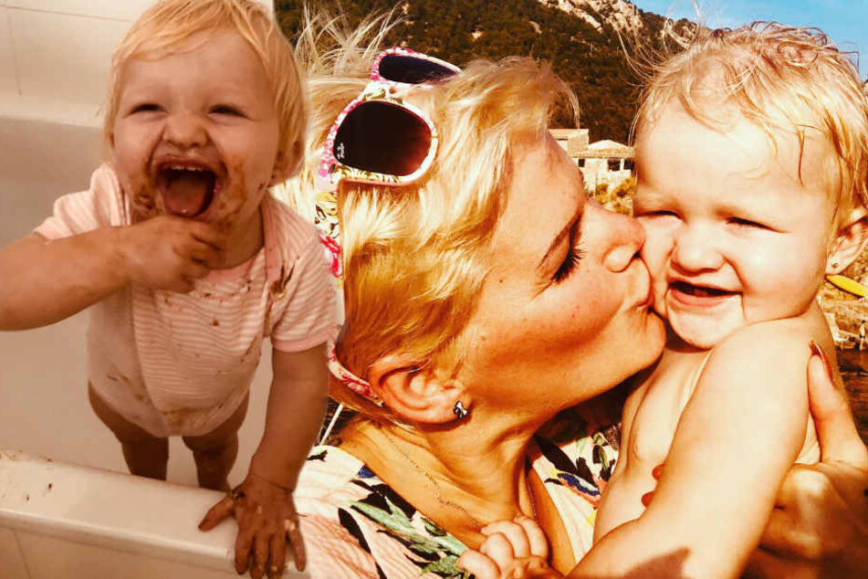Nachdem Mia Rose (1) der Geburtstagskuchen offensichtlich gut geschmeckt hat, stießen Mama Melanie Müller und Ehemann Mike Blümer im Bierkönig auf ihren Nachwuchs an.