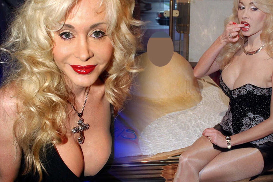So kennt man sie normalerweise, Dolly Buster strahlt in die Kamera.