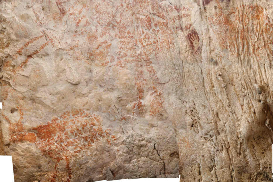 Verschiedene Zeichnungen auf Stein (undatierte Aufnahme) aus einer Höhle auf Borneo.