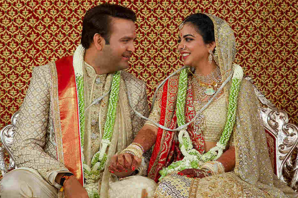 Beyoncé trifft Bollywood: Die Hochzeit von Isha Ambani (r.) und Anand Piramal brachte die A-Prominenz zweier Länder zusammen.