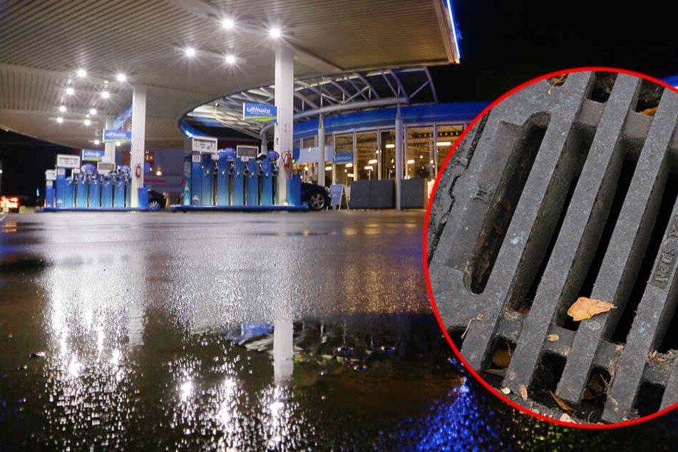 Die Unbekannten rissen erst die Rolläden der Tankstelle herunter und warfen dann einen Gullydeckel durch die Fensterscheibe (Symbolbild).