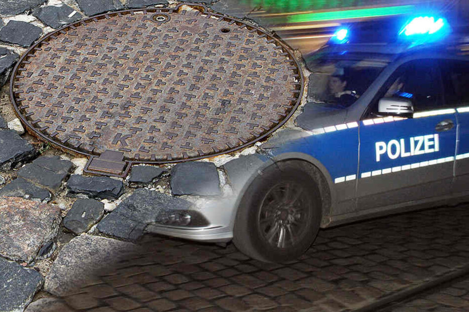 Die flüchtigen Verbrecher schlugen das Schaufenster mit einem Gullideckel ein. (Symbolbild)