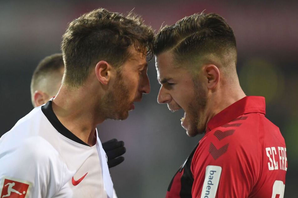 Eintracht-Kapitän David Abraham (Li.) brannten am Sonntag gegen den SC Freiburg alle Sicherungen durch.