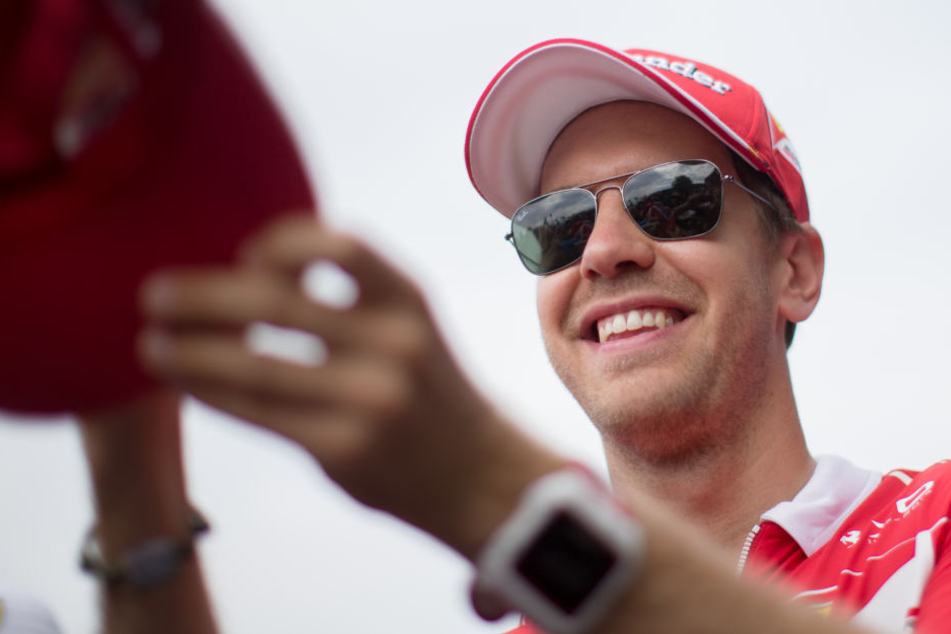 Hat gut Lachen: Sebastian Vettel und Ferrari verlängern die Zusammenarbeit bis Ende 2020.
