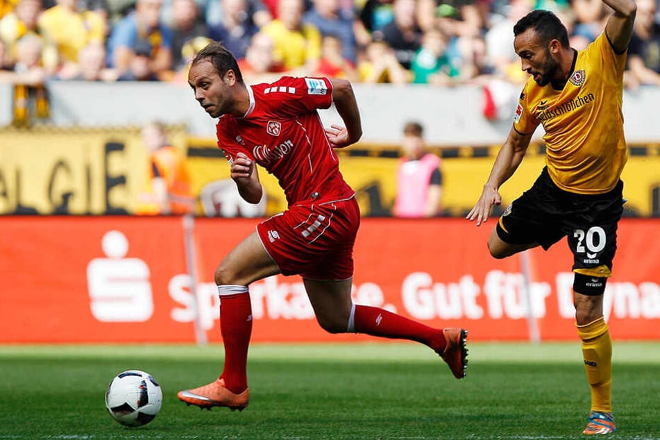 Einst gemeinsam beim FC Erzgebirge, hier getrennt und ab 1. Juli wieder in
einem Team: Würzburgs Rico Benatelli
(l.) und Dresdens Fabian Müller.