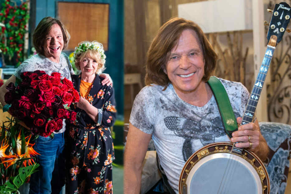 Jürgen Drews, Schlagersänger, und Madeleine Lierck-Wien, Schauspielerin, stehen im Studio, in dem "Rote Rosen" gedreht wird. Der Sänger ist in seinem Gastspiel unter anderem auf der Suche nach seinem Banjo.