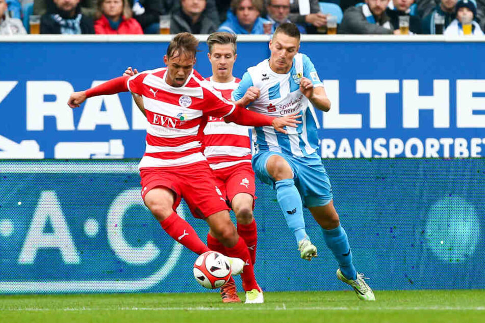 Maurice Pluntke (l.), Christoph Göbel und Daniel Frahn (r.).
