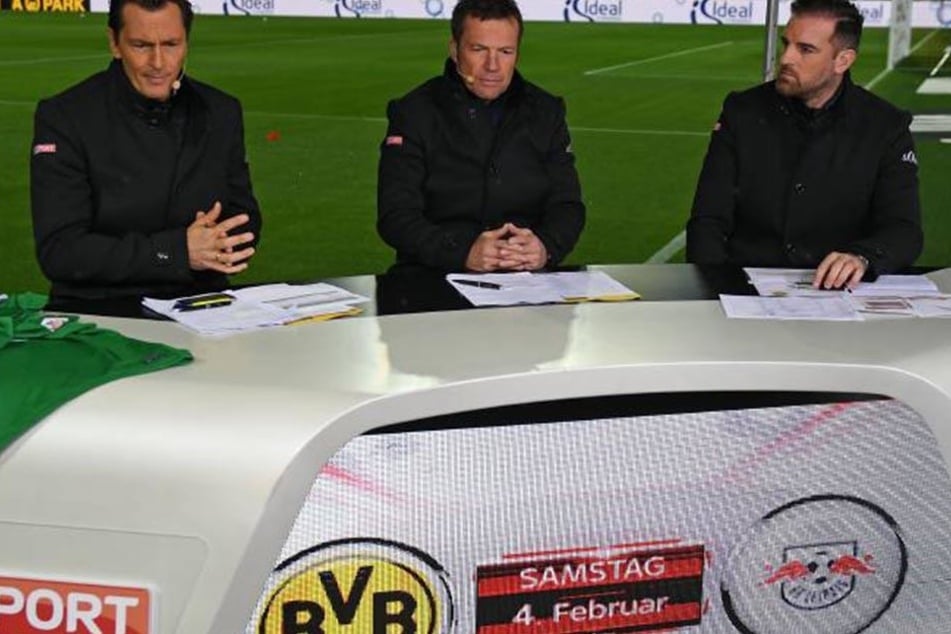 Sky-Moderator Sebastian Hellmann (links) zeigte sich von dem Stangenwurf erschüttert.