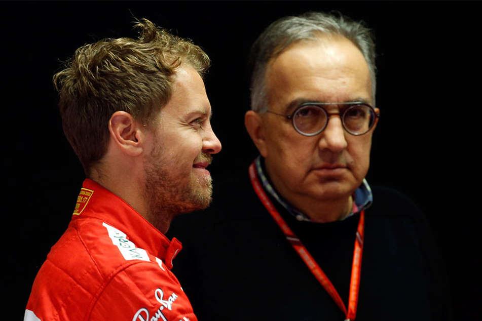 Sebastian Vettel (l) mit Sergio Marchionne: Der Ferrari-Boss musste sich aufgrund seines Gesundheitszustandes zurückziehen.
