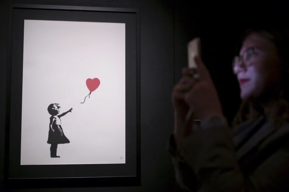 Das berühmte Banksy-Werk "Girl and Balloon" schredderte sich nach seinem Verkauf selbst.