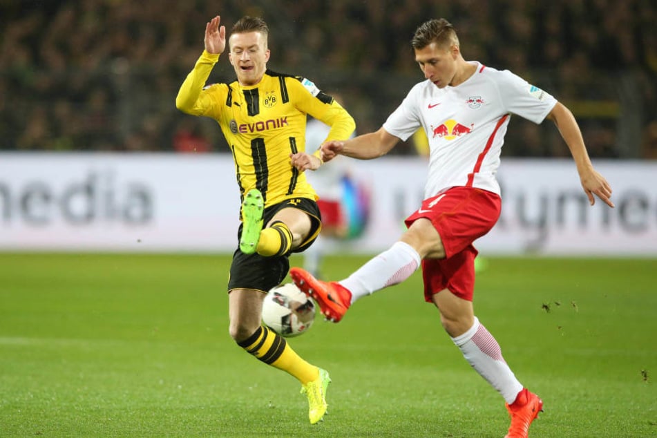 Orban im Zweikampf mit Reus. Die Dortmunder ließen zahlreiche Großchancen aus.