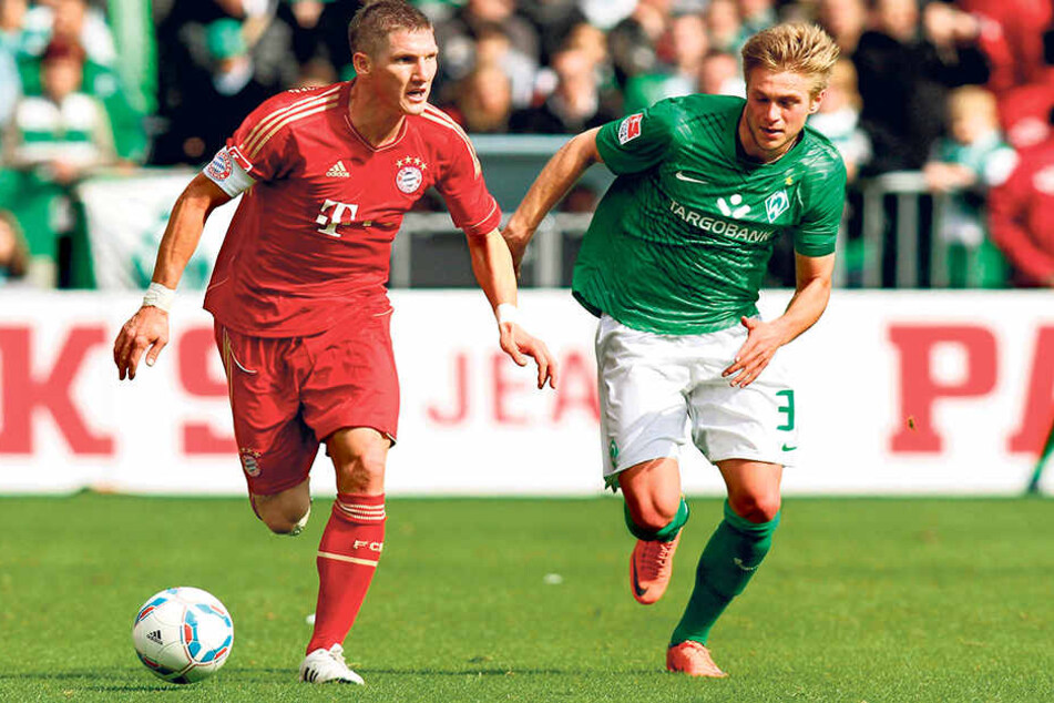 Der heutige Chemnitzer Florian Trinks (r.) in der Bundesliga-Saison 2011/12 als Bremer im Zweikampf mit Bastian Schweinsteiger.