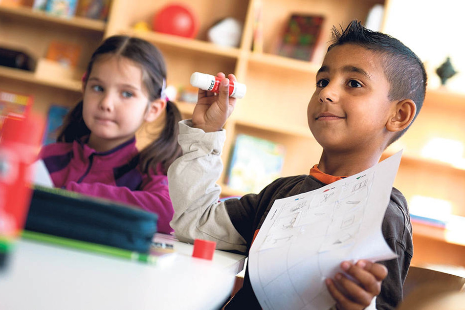 „Deutsch als Zweitsprache“-Unterricht in einer Grundschule in Heidenau. Ziel
ist, dass sie am Regelunterricht teilnehmen.