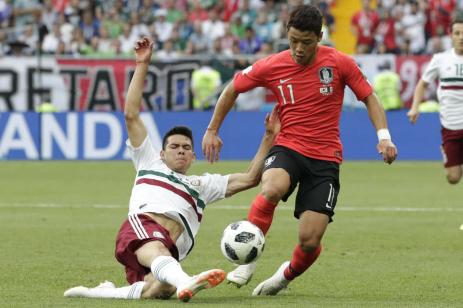 Hee-Chan Hwang (r) während der WM 2018 im Spiel gegen Mexiko. (Archivbild).