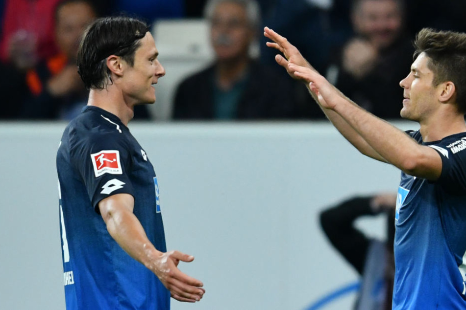 Nico Schulz (l.) jubelt mit TSG-Hoffenheim-Kollege Andrej Kramaric (27).