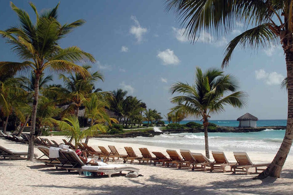 Die Dominikanische Republik mit ihren Palmen und Stränden wie hier in Punta Cana gilt als beliebtes Urlaubsziel - doch wie lange noch?