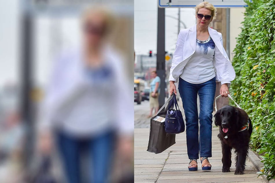 Symbiotisch unterwegs:
Carola Engelmann (52)
im Duo mit Blindenführhund
„Thor“. Der
Flat-Coated weicht nie
von ihrer Seite.