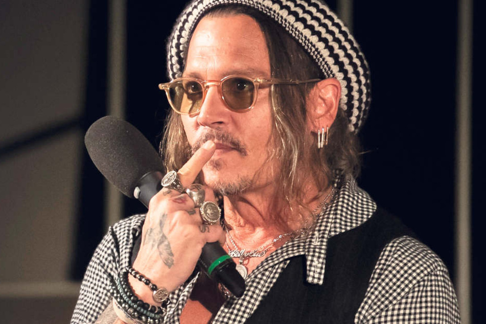 Johnny Depp (55).