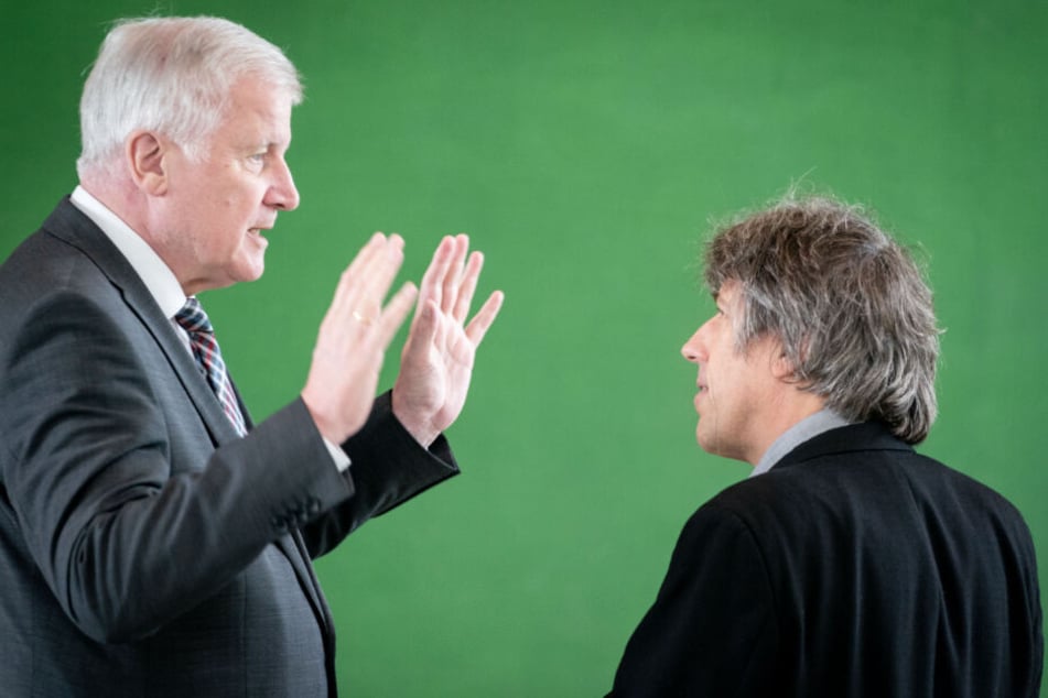 Horst Seehofer (l, CSU).