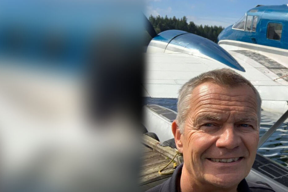 Alex Bahlsen (61) vor einem Flugzeug.