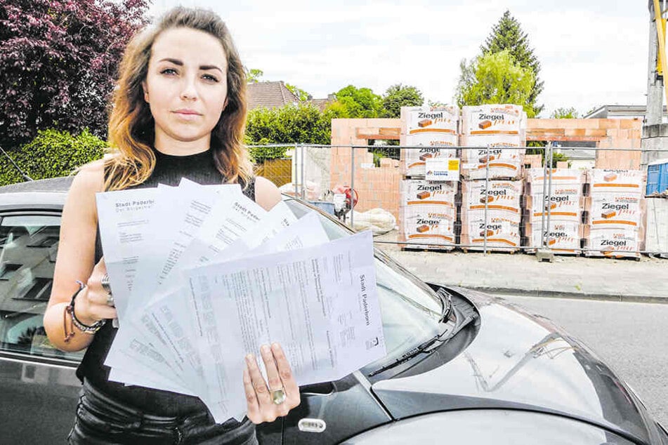 Fabienne (25) ärgert sich über die Post von der Stadt.