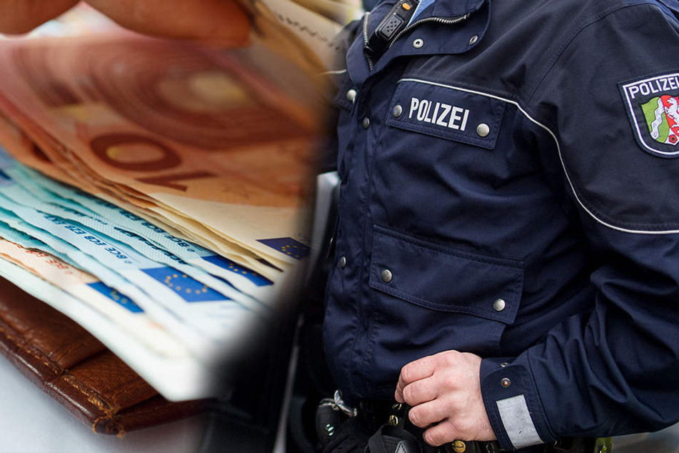 Der Mann in Düsseldorf wurde von falschen Polizisten um 700 Euro gebracht.