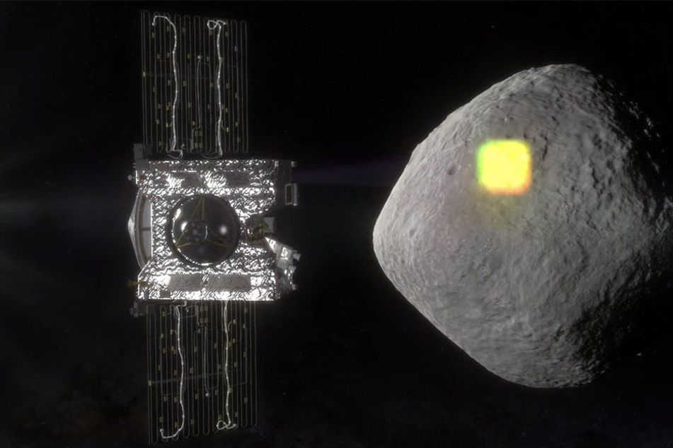 Die undatierte Illustration zeigt die Sonde Osiris Rex (l) und den erdnahen Asteroiden Bennu.