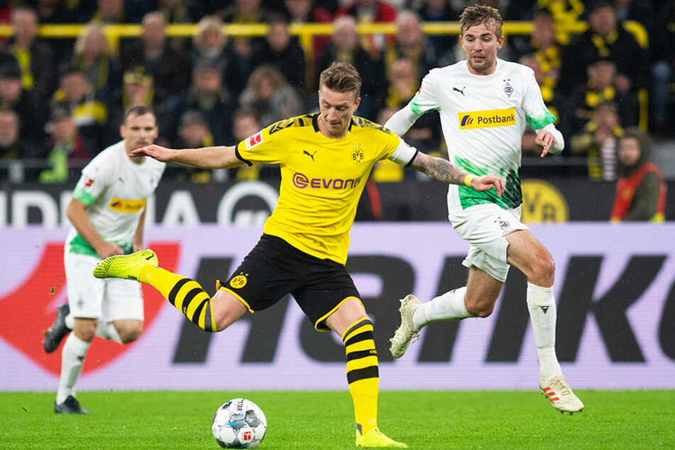Obwohl Borussia Mönchengladbach bei Borussia Dortmund verlor, stehen die Fohlen weiter an der Tabellenspitze.