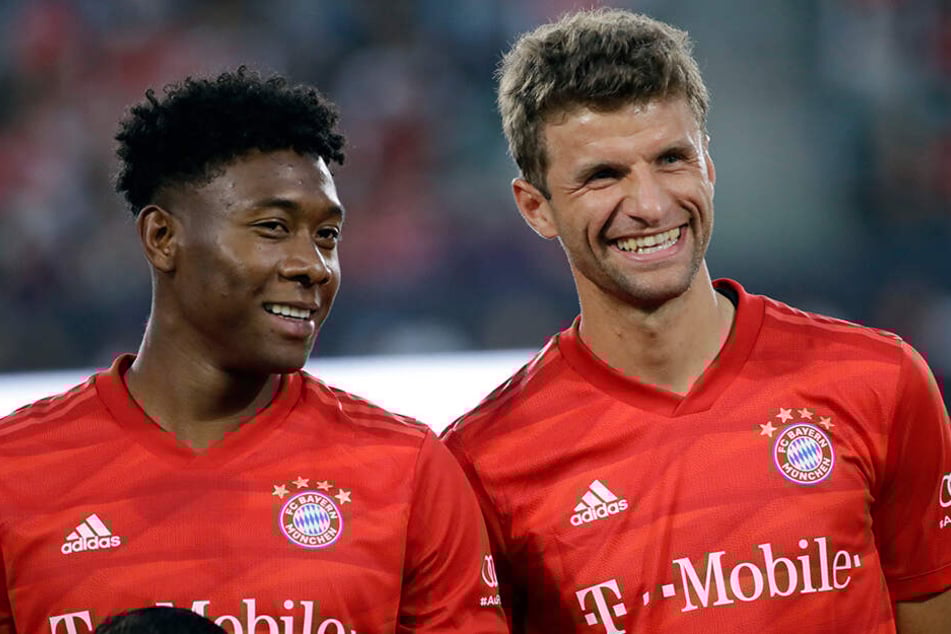 David Alaba und sein Teamkollege Thomas Müller.