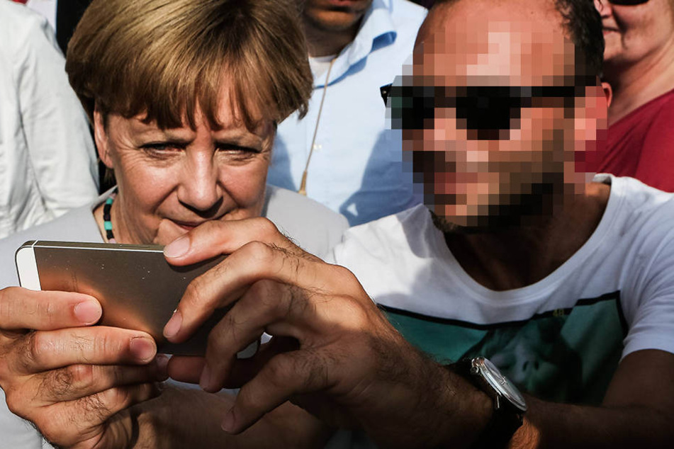 Der Mann ist auf einem Selfie mit Bundeskanzlerin Angela Merkel (62, CDU) zu sehen, das Unbekannte für Hetze in dem Netzwerk genutzt haben sollen. (Symbolbild)