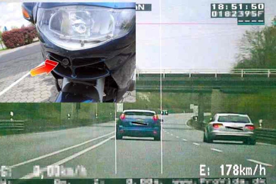 Nur ein kleines Kamera-Objektiv lugt aus der BMW-Verkleidung.