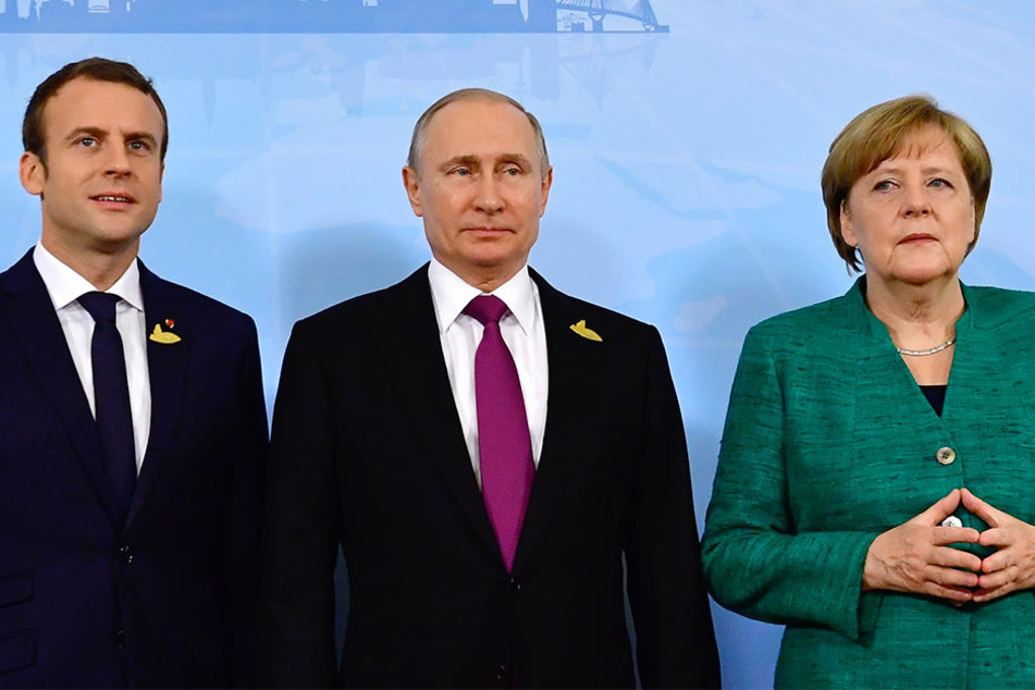 Beim G20 Gipfel posierten Macron, Putin und Merkel noch gemeinsam vor der Kamera. Jetzt verschärfen sie gegenüber Russland den Ton.