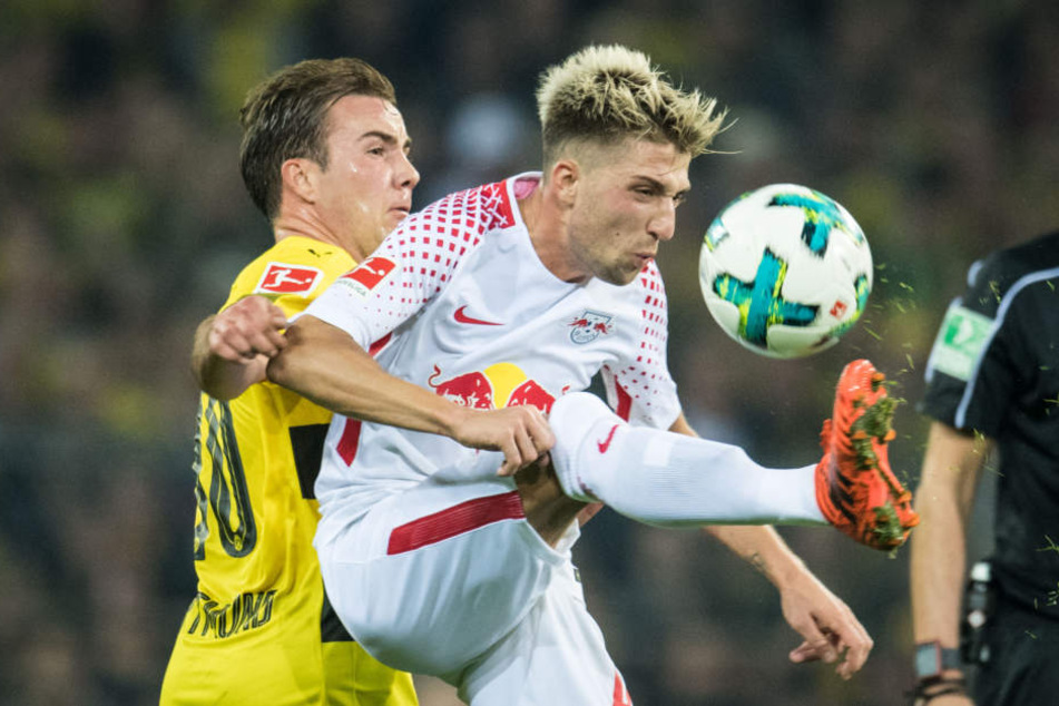 Duellieren sich nach dem 3:2-Hinrundensieg diesmal in Leipzig: Dortmunds Mario Götze (l.) und Kevin Kampl.