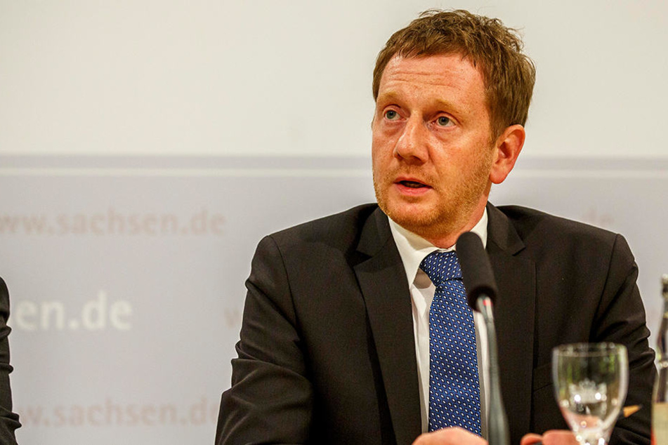 Ministerpräsident Michael Kretschmer will am Wochenende den Sachsenring besuchen und ein Signal setzen.