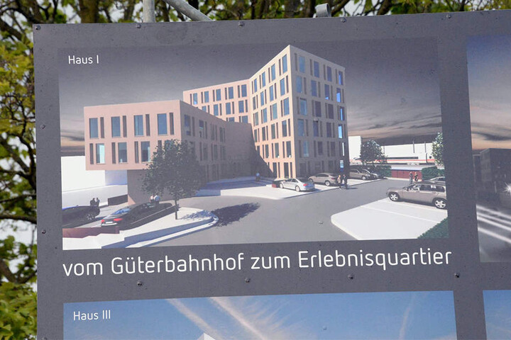 An der Stelle, wo jetzt die Waggons stehen, entsteht in Zukunft das Haus 1.