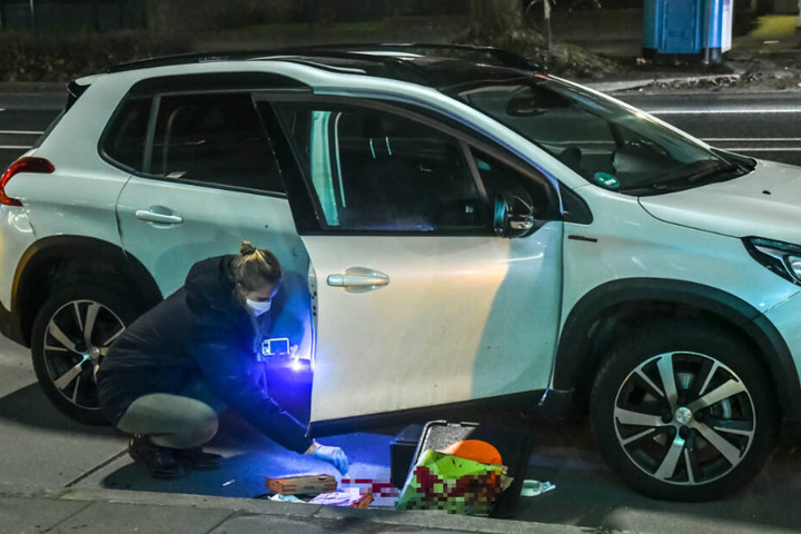 Die blutverschmierten Pizzakartons blieben am Tatort zurück.