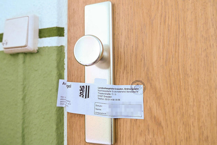 Am 9. Januar machte die Polizei hinter dieser Tür einen grausamen Fund. Nun ist die Wohnung versiegelt.
