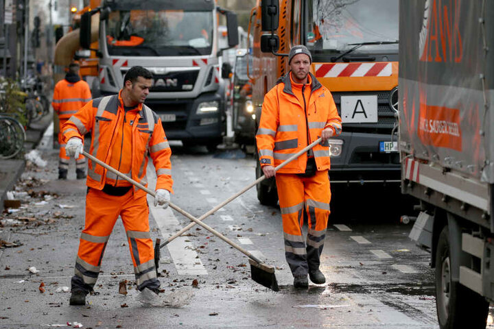 Mitarbeiter der Straßenreinigung in Köln.