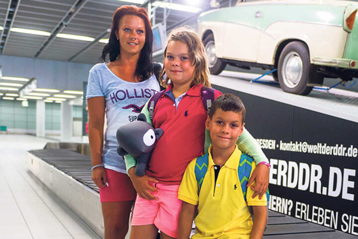 Die Dresdnerin Julia Drobisch (30) mit ihren Kindern Melina (8) und
Maximilian (7).