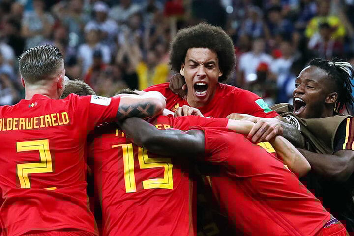 Belgische Jubeltraube: In letzter Sekunde rang der Favorit nach einer furiosen Aufholjagd die tapferen Japaner nieder.