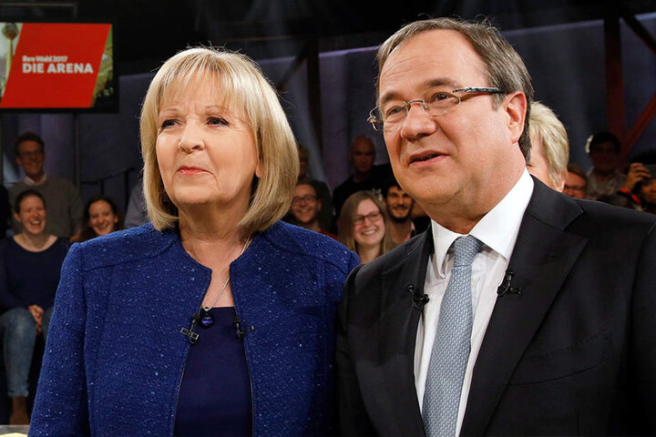 Hannelore Kraft (SPD) und Armin Laschet (CDU) liefern sich ein knappes Kopf-an-Kopf-Rennen.