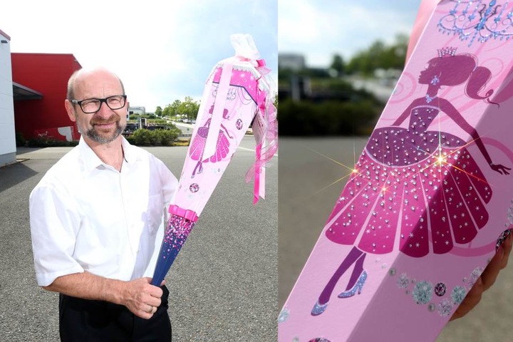 Chef Klaus Roth mit einem der Luxusmodelle für die anspruchsvolle Schulanfängerin. Die Swarovski-Kristalle zieren das Kleid der Prinzessin, die - natürlich im schönsten Rosarot - auf der Schultüte prangt.