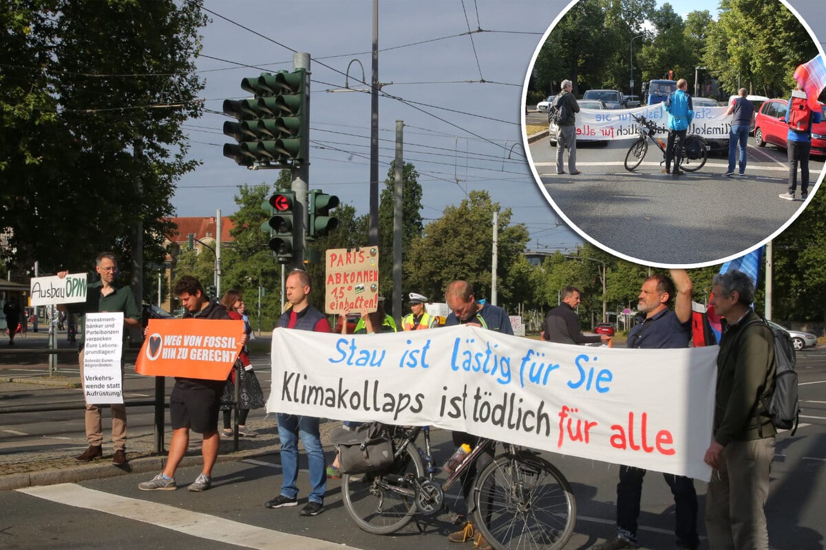 Blockade am Albertplatz! Klimaschützer versperren Autofahrern den Weg