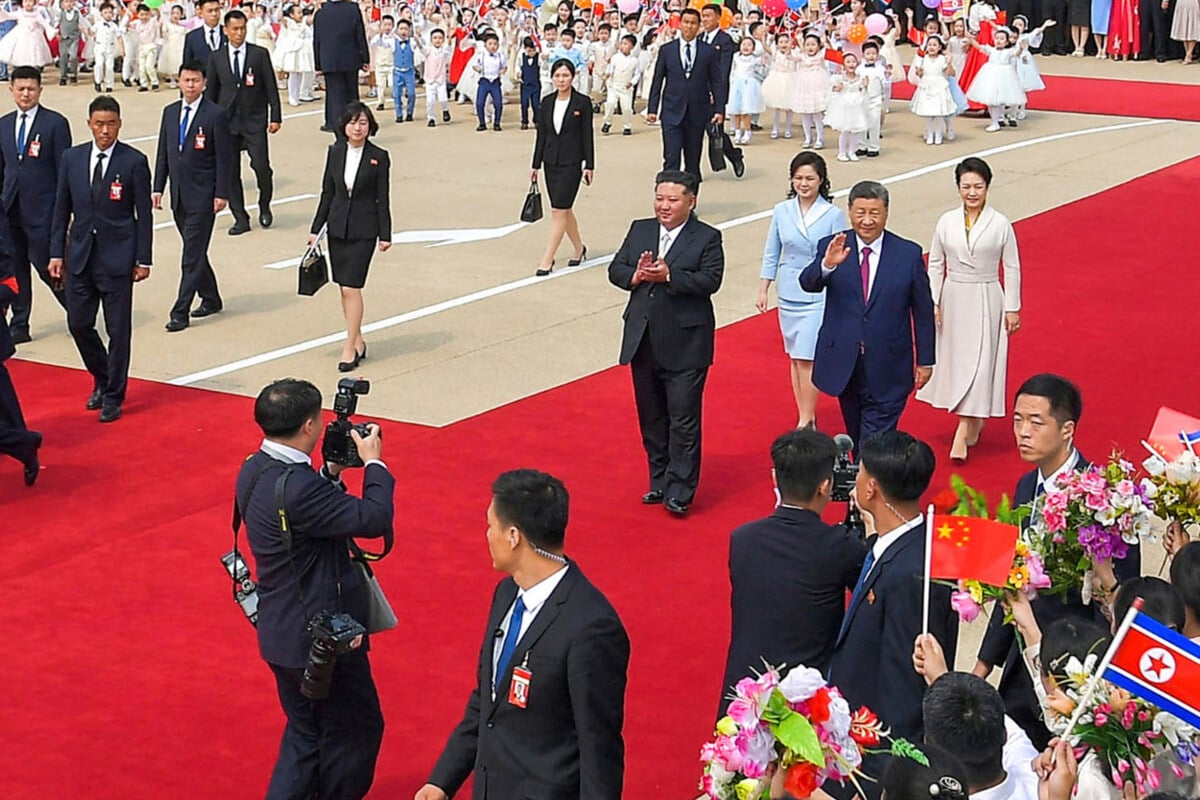 China's Xi says he's ready to work with Kim Jong Un towards more "stable" ties