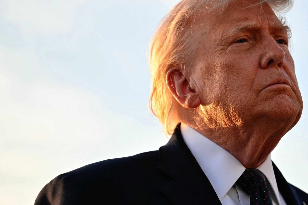 Trump signs hard copy of deal to end Iran war at Palace of Versailles
